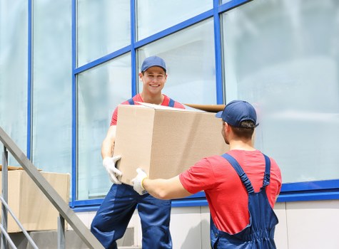 Commercial removal truck transporting office equipment in Richmond