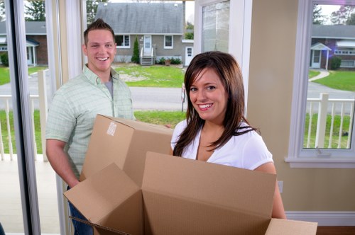 Professional packing team preparing household boxes in Richmond