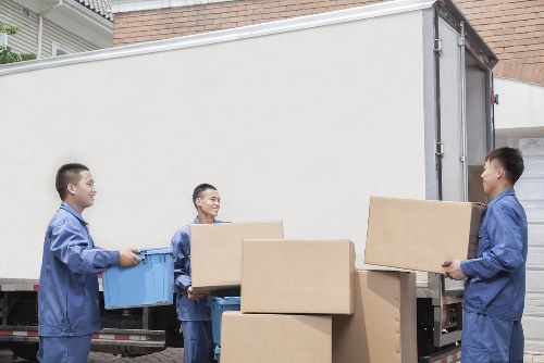 Local moving truck helping with furniture and boxes in Richmond