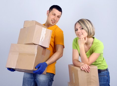 Removing sofas and wardrobes from a Richmond home during a furniture collection