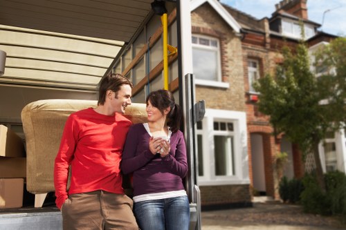 Professional movers handling boxes and furniture in Richmond
